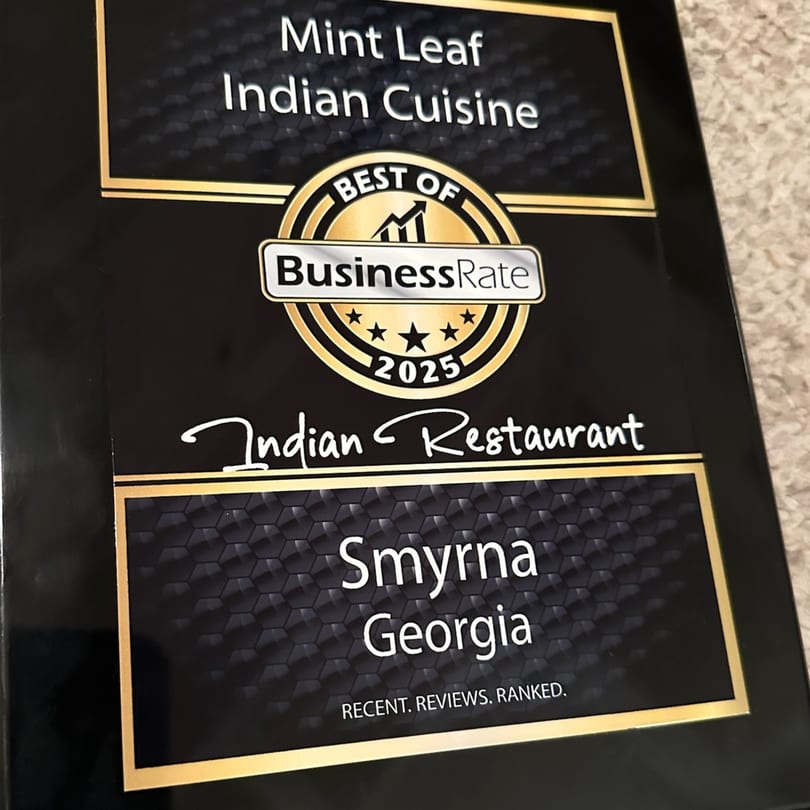 Mint Leaf Indian Cuisine's "Best of BusinessRate 2025 Indian Restaurant" award for Smyrna, Georgia.